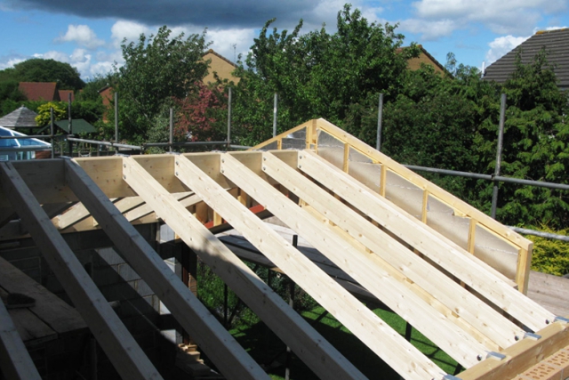 Single storey extension at Bradley Stoke. Detail of the glulam timber roof structure. Single storey extension at Bradley Stoke. Detail of glulam timber roof structure