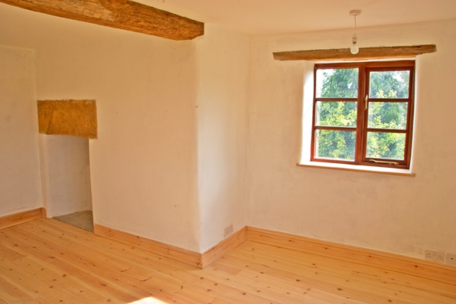 The natural beauty of lime plaster and exposed oak beams