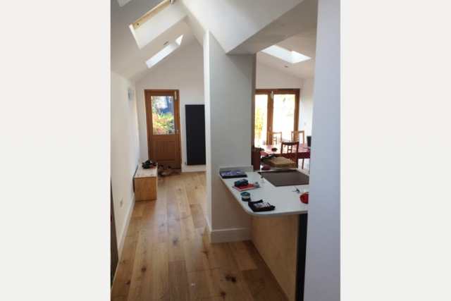 Side infill kitchen and dinner extension with parapet gutters